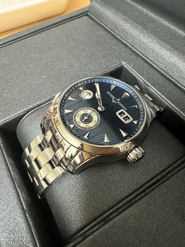 Luxury watch being examined and authenticated at International Pawn Orlando